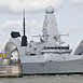HMS DEFENDER passes through the Thames Barrier